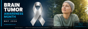 Brain cancer surviver sitting being thankful for Brain Tumor Awareness month at BeWonderNow Inc.