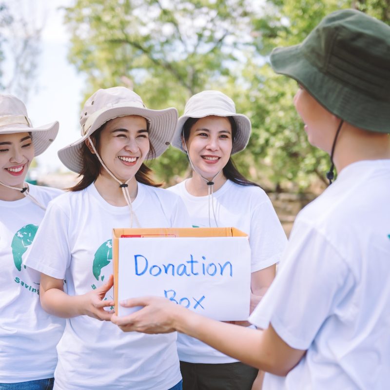 group-of-asian-diverse-people-volunteer-holding-a-donation-box-for-world-environment-day-campaign-.jpg